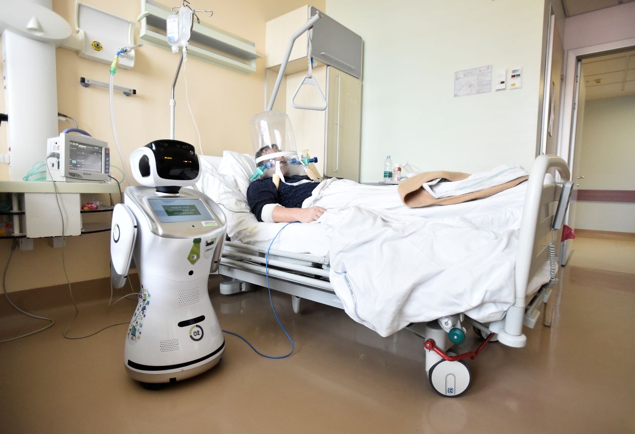 Covid-19: Tommy the robot nurse helps keep Italy doctors safe from coronavirus